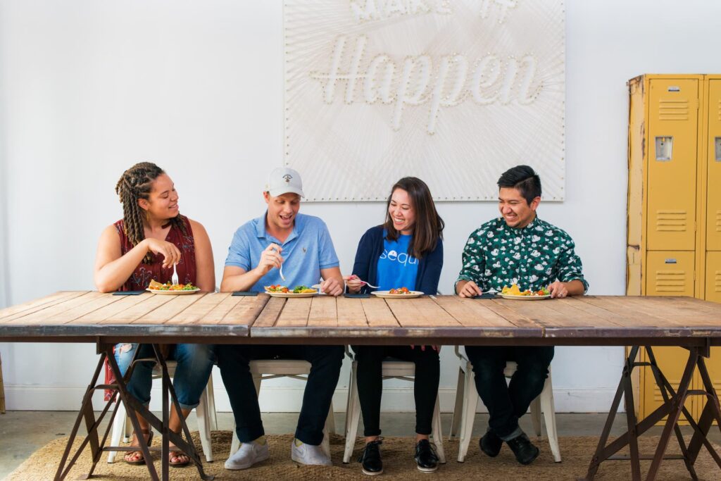 staff eating lunch at a table