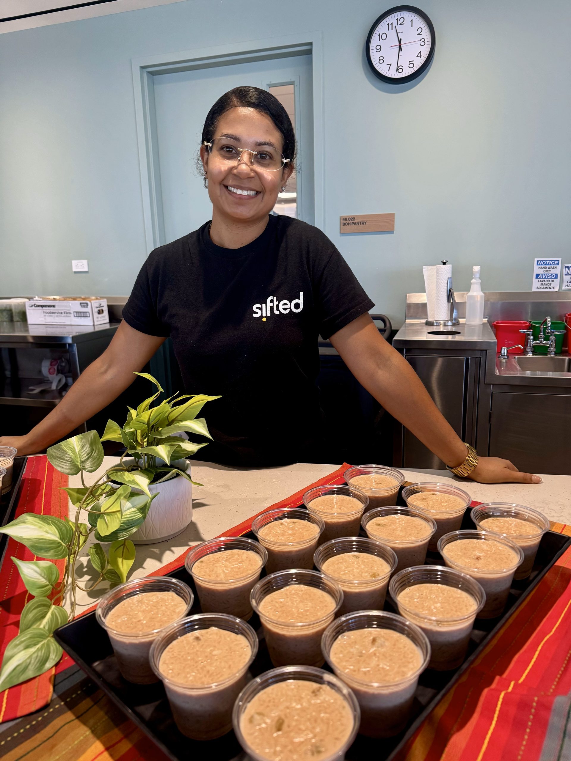 Sifted team member serving lunch at Sifted's client office